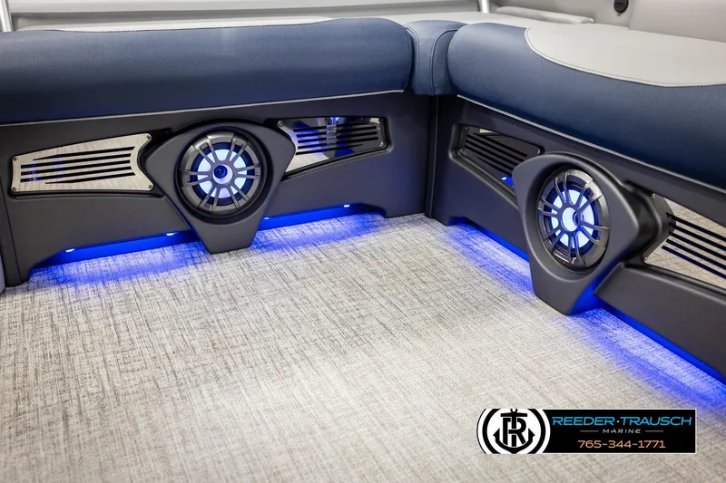 Slide: The Image of Luxurious 2026 Avalon LSZ VRB boat interior with blue LED lighting and modern speaker system. - 44
