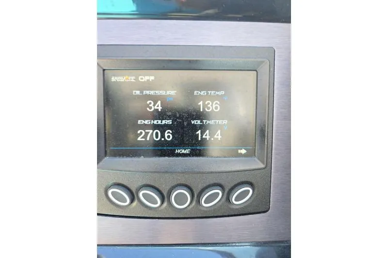 Slide: The Image of Dashboard display of a 2020 MasterCraft NXT20 showing engine metrics. - 15