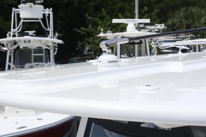 Slide: The Image of 2026 Regulator 25 boat with Garmin equipment on the deck, showcasing sleek design. - 13