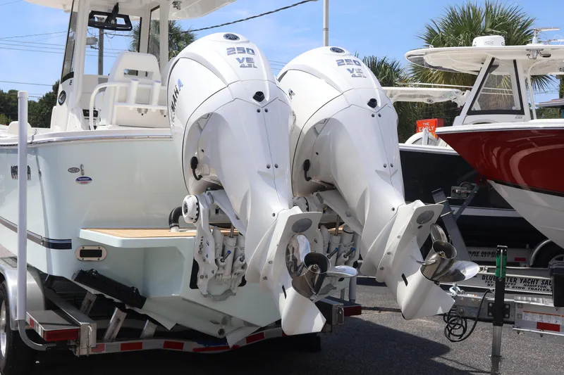 Slide: The Image of 2026 Regulator 25 boat with dual Yamaha 250 V6 engines on a trailer. - 3