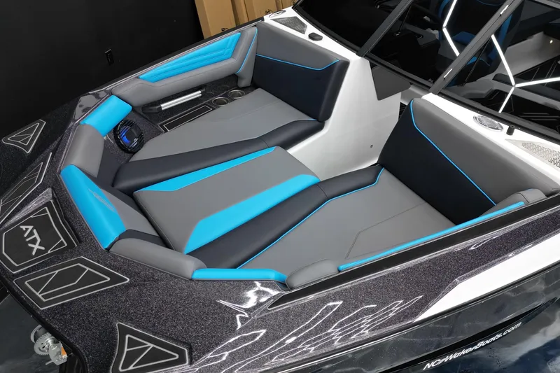 Slide: The Image of 2026 ATX Surf Boats 22 Type-S interior with blue and gray seating. - 10