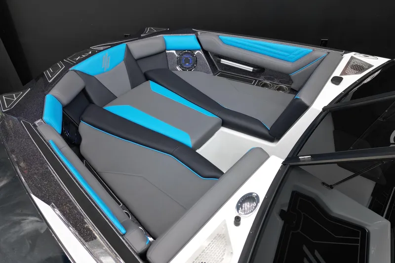 Slide: The Image of 2026 ATX Surf Boats 22 Type-S interior with sleek gray and blue seating design. - 11