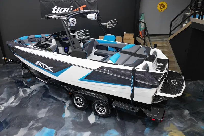 Slide: The Image of 2026 ATX Surf Boats 22 Type-S in showroom, featuring sleek design and modern amenities. - 9