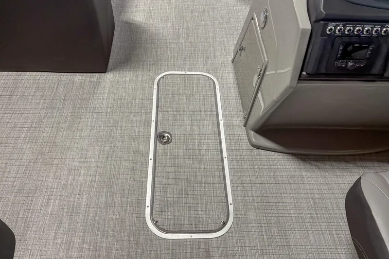 Slide: The Image of 2025 Trifecta 24 RF CS boat interior with sleek flooring and control panel. - 5