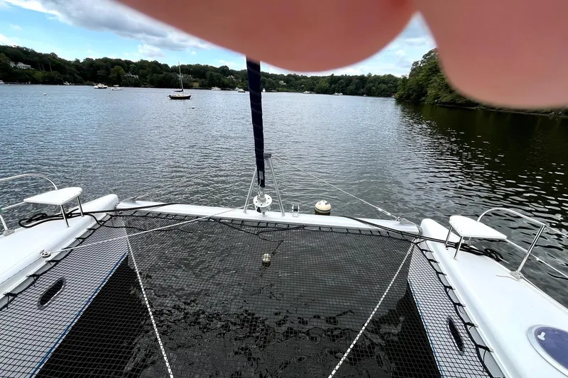 Slide: The Image of Mast and radar equipment on 2000 Fountaine Pajot Belize 43 catamaran under cloudy sky. - 19