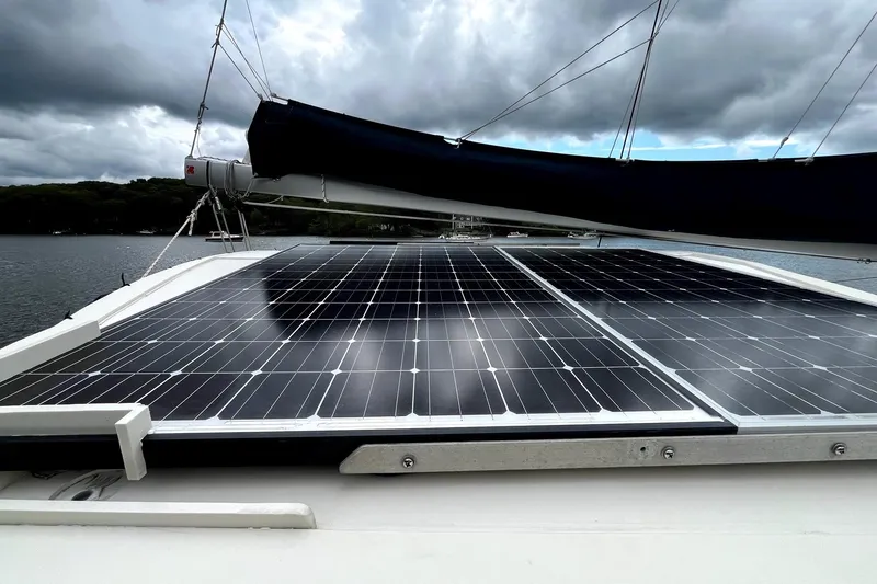 Slide: The Image of Mast detail of 2000 Fountaine Pajot Belize 43 catamaran on calm water. - 21