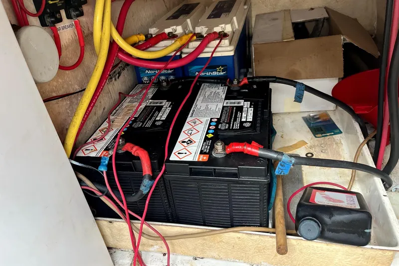 Slide: The Image of Solar panels on a 2000 Fountaine Pajot Belize 43 catamaran under cloudy skies. - 22