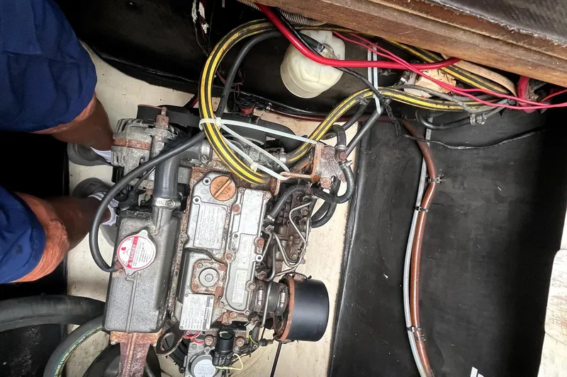 Slide: The Image of Battery compartment of a 2000 Fountaine Pajot Belize 43 catamaran with wiring and components. - 23