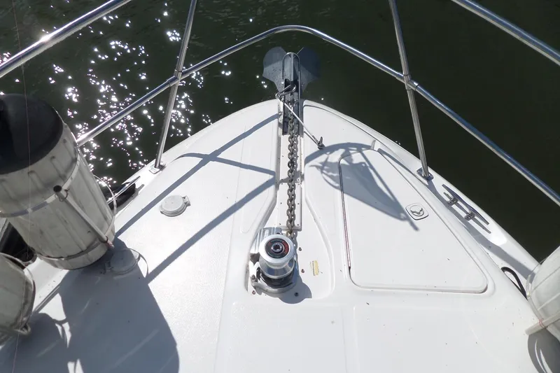 Slide: The Image of Bow of 2000 Sea Ray 380 Aft Cabin yacht with anchor and chain. - 116