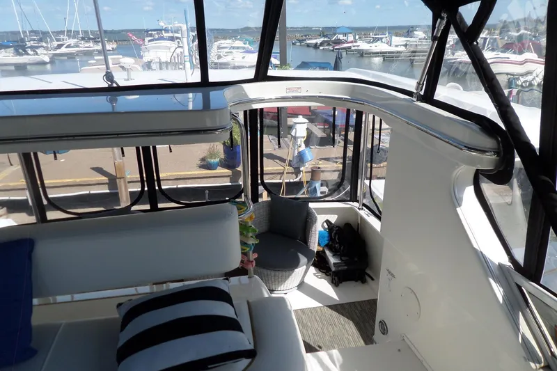 Slide: The Image of Interior view of a 2000 Sea Ray 380 Aft Cabin yacht at a marina. - 13