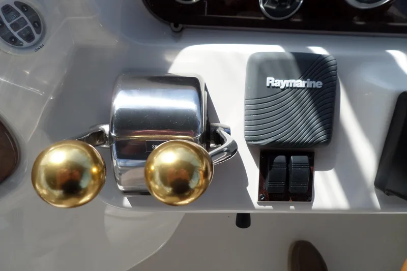 Slide: The Image of Control panel of 2000 Sea Ray 380 Aft Cabin with Raymarine equipment. - 19