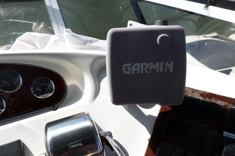 Slide: The Image of Garmin device on 2000 Sea Ray 380 Aft Cabin boat dashboard. - 23