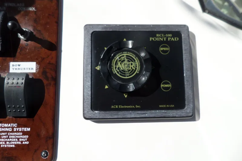 Slide: The Image of Control panel of a 2000 Sea Ray 380 Aft Cabin with bow thruster and point pad. - 26