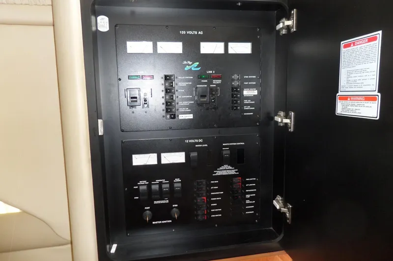 Slide: The Image of Electrical control panel on a 2000 Sea Ray 380 Aft Cabin boat. - 47