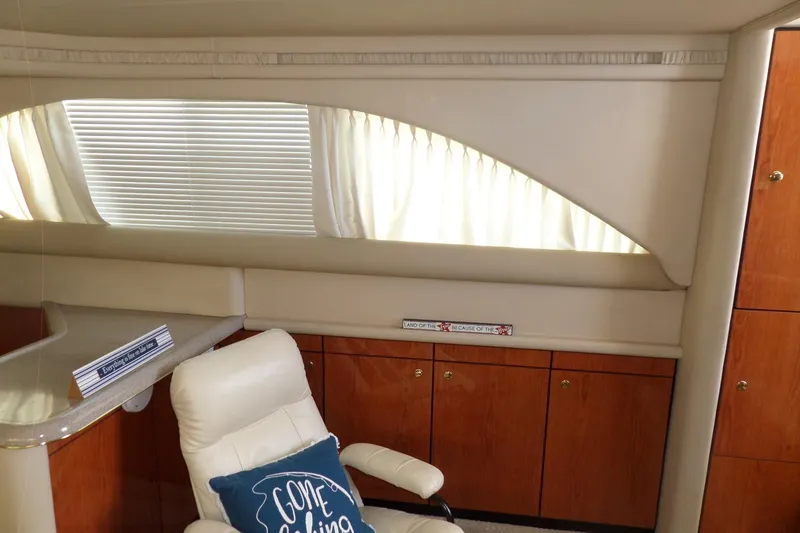 Slide: The Image of Luxurious interior of 2000 Sea Ray 380 Aft Cabin with elegant wood cabinetry. - 49
