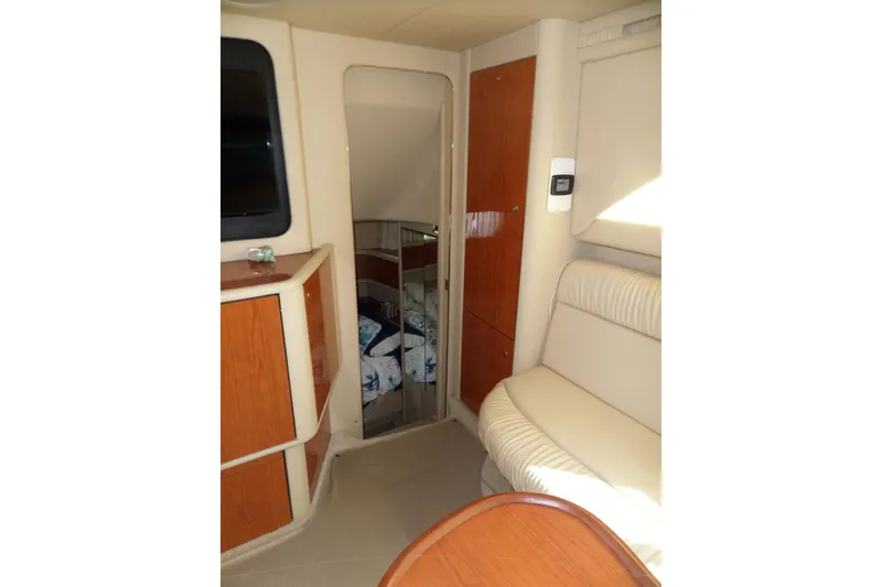 Slide: The Image of Interior of 2000 Sea Ray 380 Aft Cabin yacht with seating and cabinetry. - 58