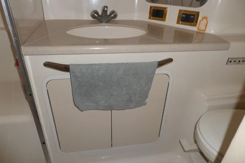 Slide: The Image of Bathroom sink area in 2000 Sea Ray 380 Aft Cabin yacht. - 71