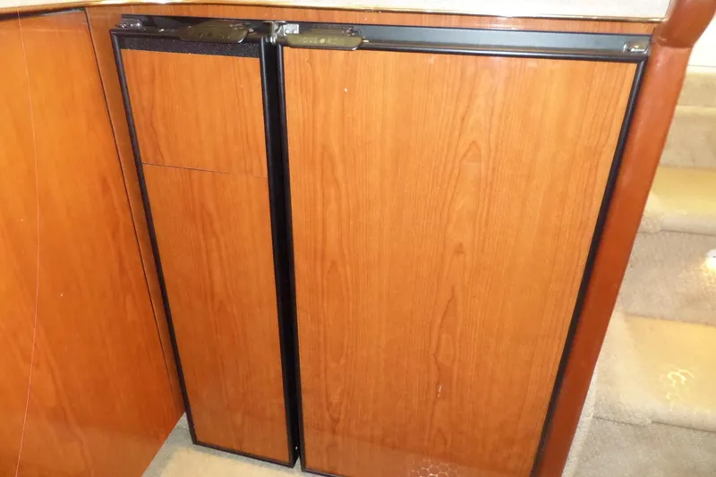 Slide: The Image of Wooden cabinetry on a 2000 Sea Ray 380 Aft Cabin yacht interior. - 78