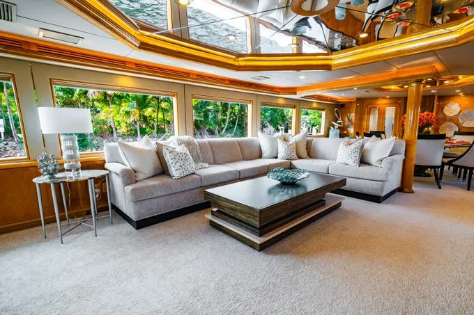 Slide: The Image of Luxurious 1995 Hatteras Motor Yacht interior with elegant seating and modern decor. - 2