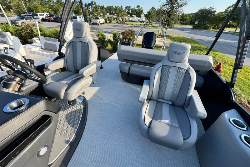 Slide: The Image of 2026 Bennington 24 MSB boat interior with luxurious seating and modern design. - 16