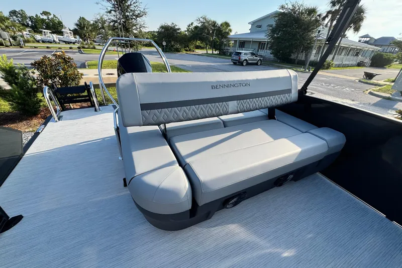 Slide: The Image of 2026 Bennington 24 MSB boat with luxurious seating and modern design. - 17