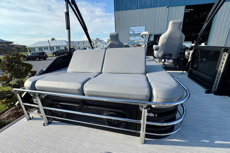 Slide: The Image of 2026 Bennington 24 MSB pontoon boat with sleek seating and modern design. - 23