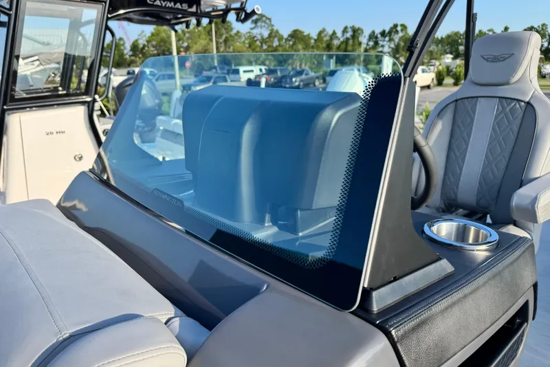 Slide: The Image of 2026 Bennington 24 MSB boat interior with windshield and seating detail. - 24