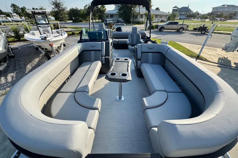 Slide: The Image of 2026 Bennington 24 MSB pontoon boat with spacious seating and modern design. - 7