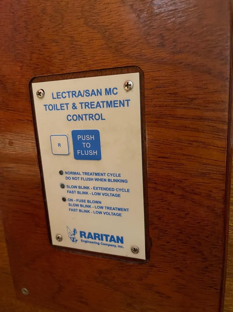 Slide: The Image of 1977 Pequod 34 Sportfish toilet and treatment control panel - 38