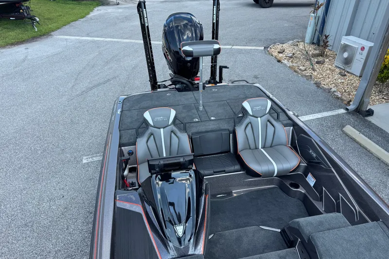 Slide: The Image of 2026 Skeeter ZXE20 boat interior with dual seats and sleek design. - 11