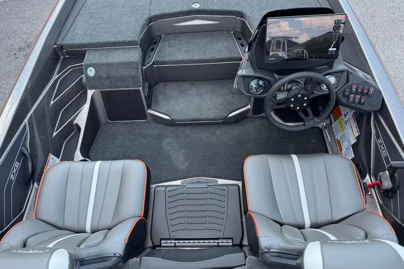 Slide: The Image of 2026 Skeeter ZXE20 boat interior with dual seats and modern dashboard. - 13