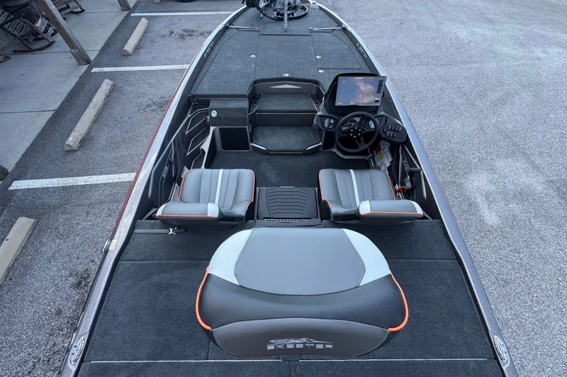 Slide: The Image of 2026 Skeeter ZXE20 boat interior with dual seats and modern dashboard. - 15