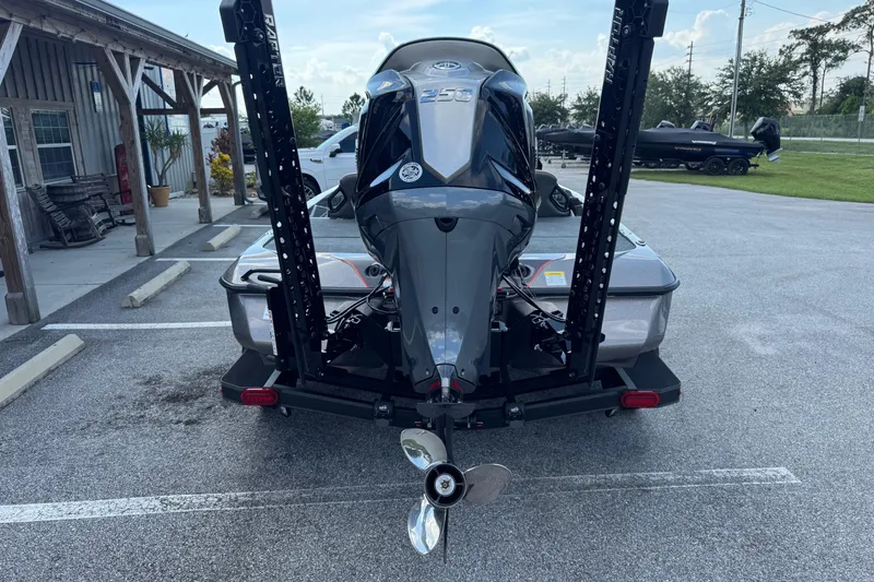 Slide: The Image of Rear view of 2026 Skeeter ZXE20 boat with powerful outboard motor. - 17