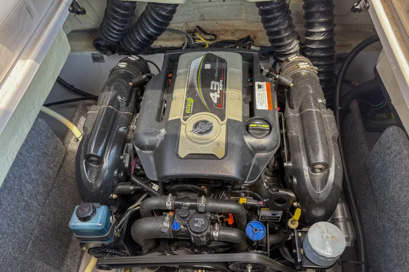 Slide: The Image of 2016 Four Winns H210 engine compartment with 4.3 MPI motor, detailed view. - 11