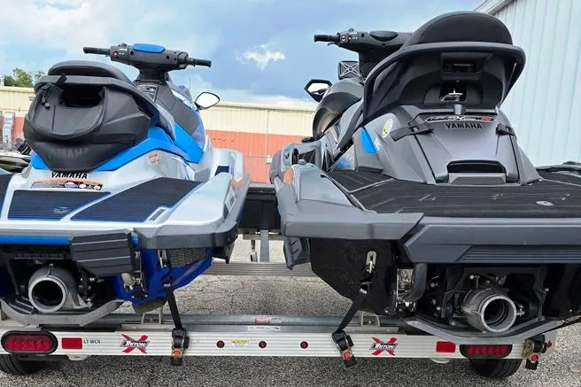 Slide: The Image of Two 2020 Yamaha WaveRunner jet skis on a trailer, ready for transport. - 2