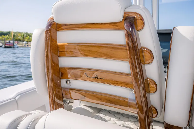 Slide: The Image of Luxurious wooden and white leather seat on 2026 Jupiter 340LS boat. - 33