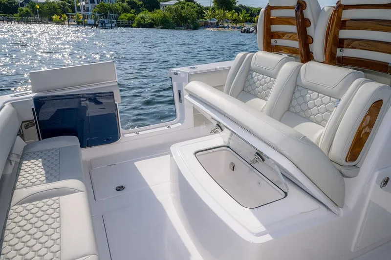 Slide: The Image of Luxurious seating on 2026 Jupiter 340LS boat with elegant design and water view. - 39