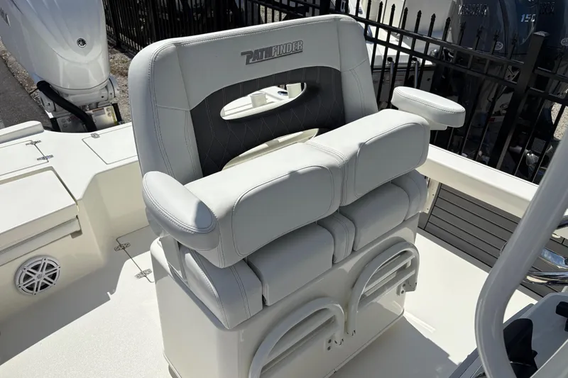 Slide: The Image of 2024 Pathfinder 2500 Hybrid boat seat with armrests and sleek design. - 11