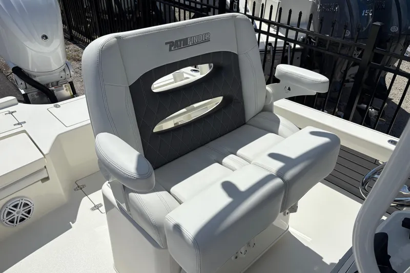 Slide: The Image of 2024 Pathfinder 2500 Hybrid boat seat with armrests and diamond-patterned backrest. - 12