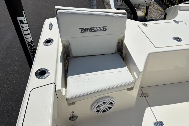 Slide: The Image of 2024 Pathfinder 2500 Hybrid boat seat with logo and cup holders. - 16
