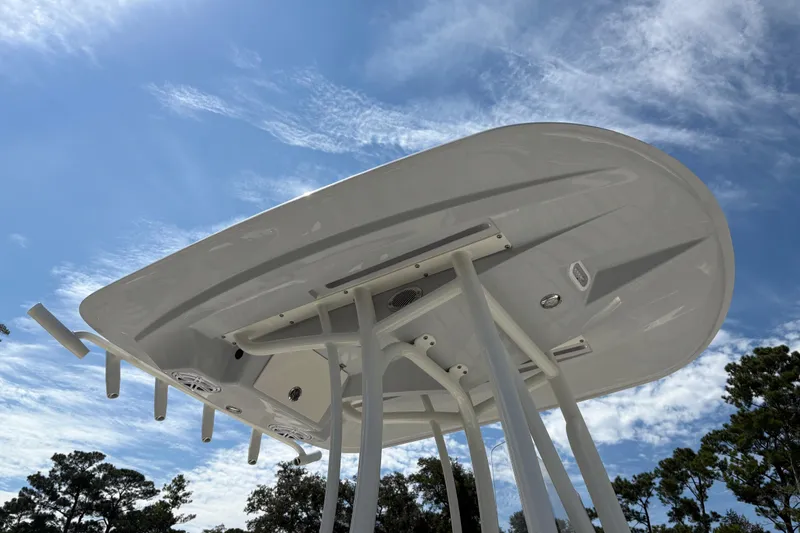 Slide: The Image of 2024 Pathfinder 2500 Hybrid boat underside against a clear blue sky. - 28