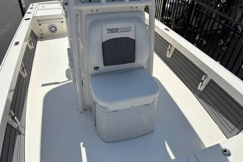 Slide: The Image of 2024 Pathfinder 2500 Hybrid boat interior with seating and storage compartments. - 9