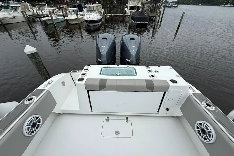 Slide: The Image of 2022 Cape Horn 34 XS boat with dual V8 engines docked at marina. - 27