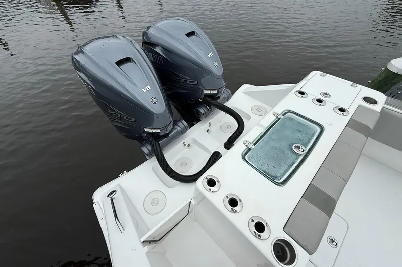 Slide: The Image of 2022 Cape Horn 34 XS boat with dual Yamaha V8 outboard engines. - 28