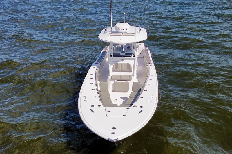 Slide: The Image of 2022 Cape Horn 34 XS boat on open water, aerial view. - 35