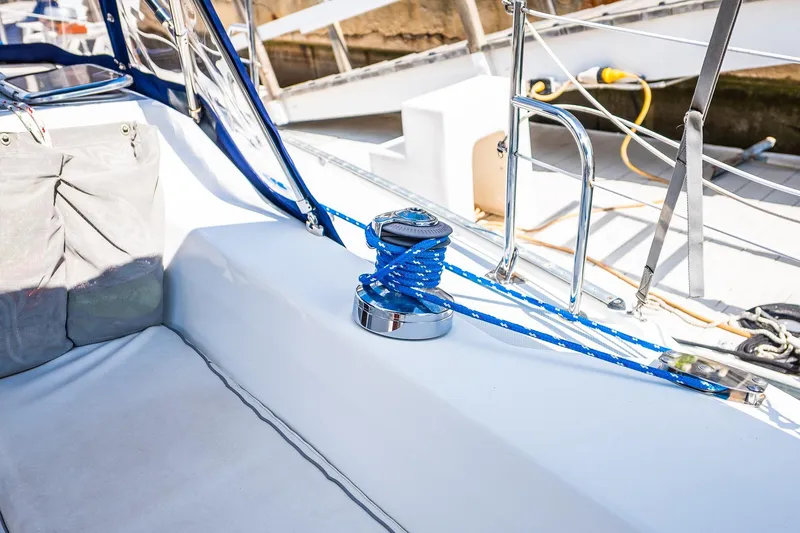 Slide: The Image of 2005 Catalina 36 MkII sailboat deck with winch and blue rope. - 20