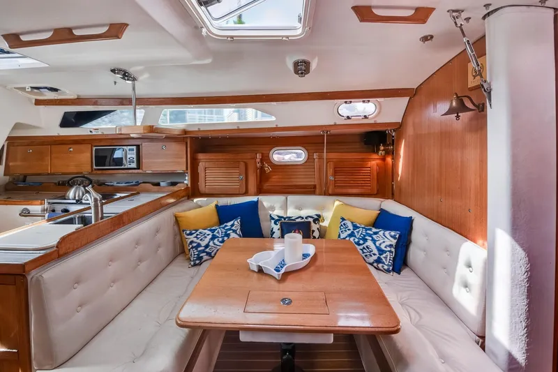 Slide: The Image of Interior of 2005 Catalina 36 MkII sailboat with cozy dining area and modern kitchen. - 23