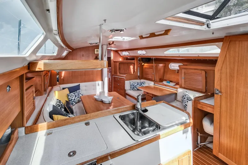 Slide: The Image of Interior of 2005 Catalina 36 MkII sailboat with wood finish and cozy seating area. - 29
