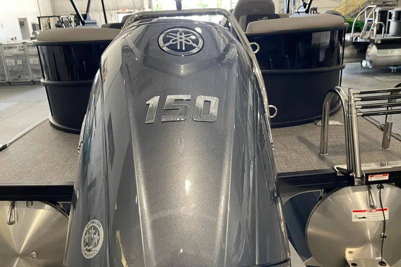 Slide: The Image of 2026 Barletta ARIA 22QC boat interior with luxurious captain's chair and sleek design. - 13