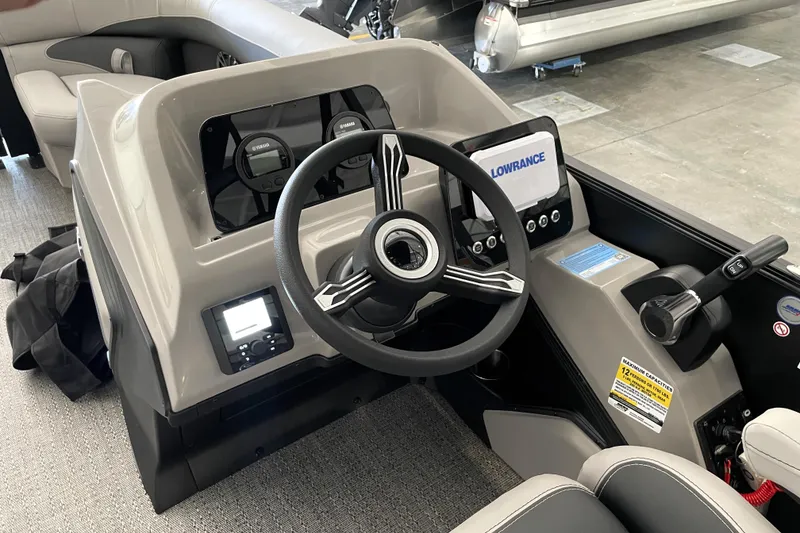 Slide: The Image of Interior of 2026 Barletta ARIA 22QC pontoon boat with seating and cup holders. - 22